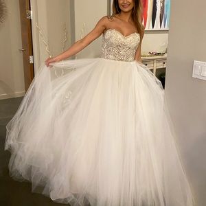 Designer wedding dress never worn.